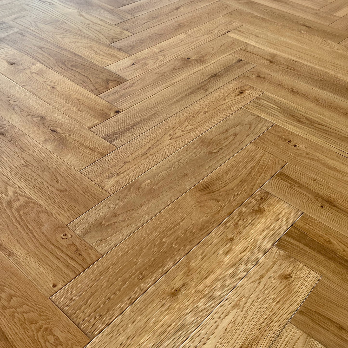Natural Oak - Herringbone 18mm Brushed & Oiled Solid Real Wood Flooring (LIBSOHB18x90NAT)