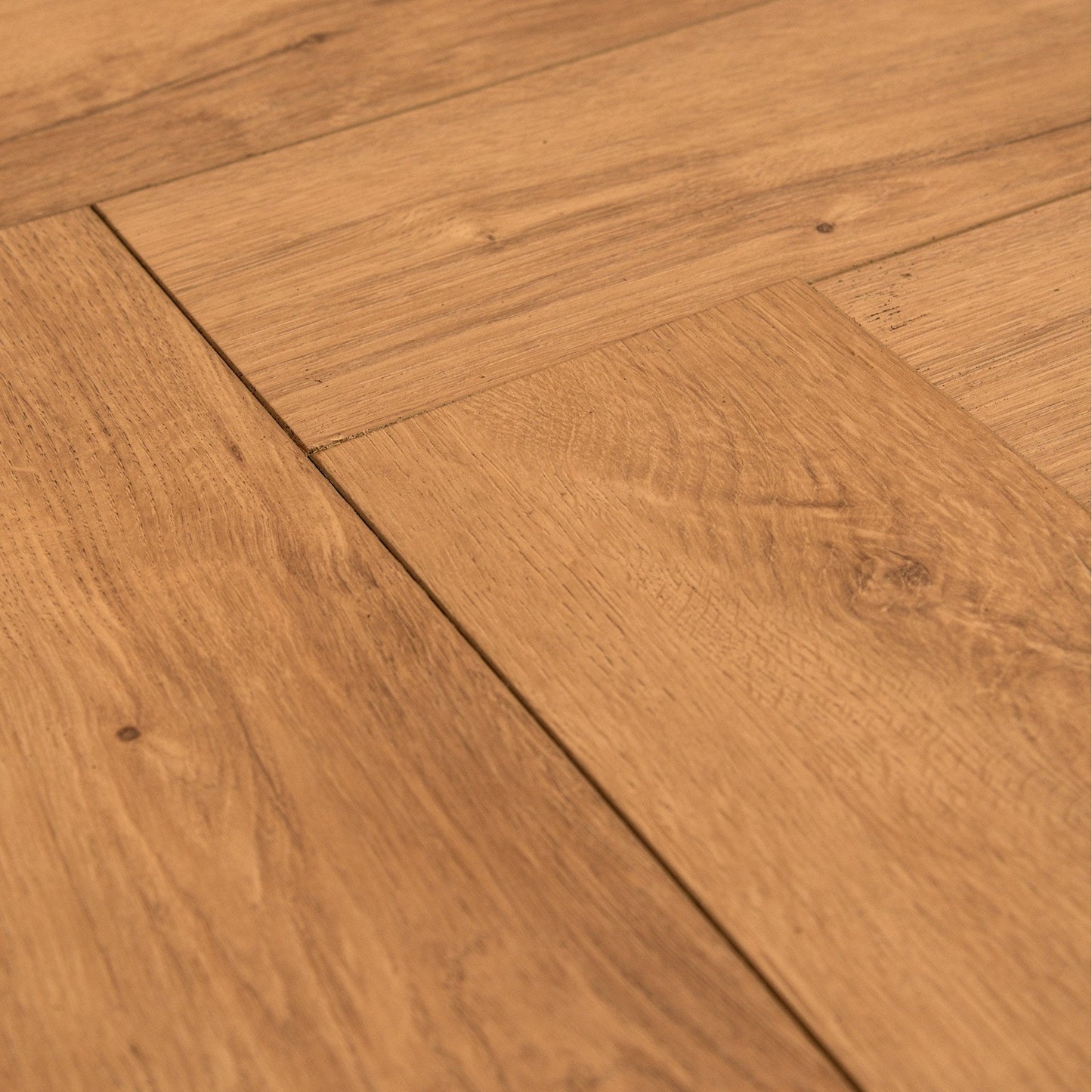 Warm Harvest Oak - Comfort Luxe 12mm Laminate Herringbone Flooring (122147)