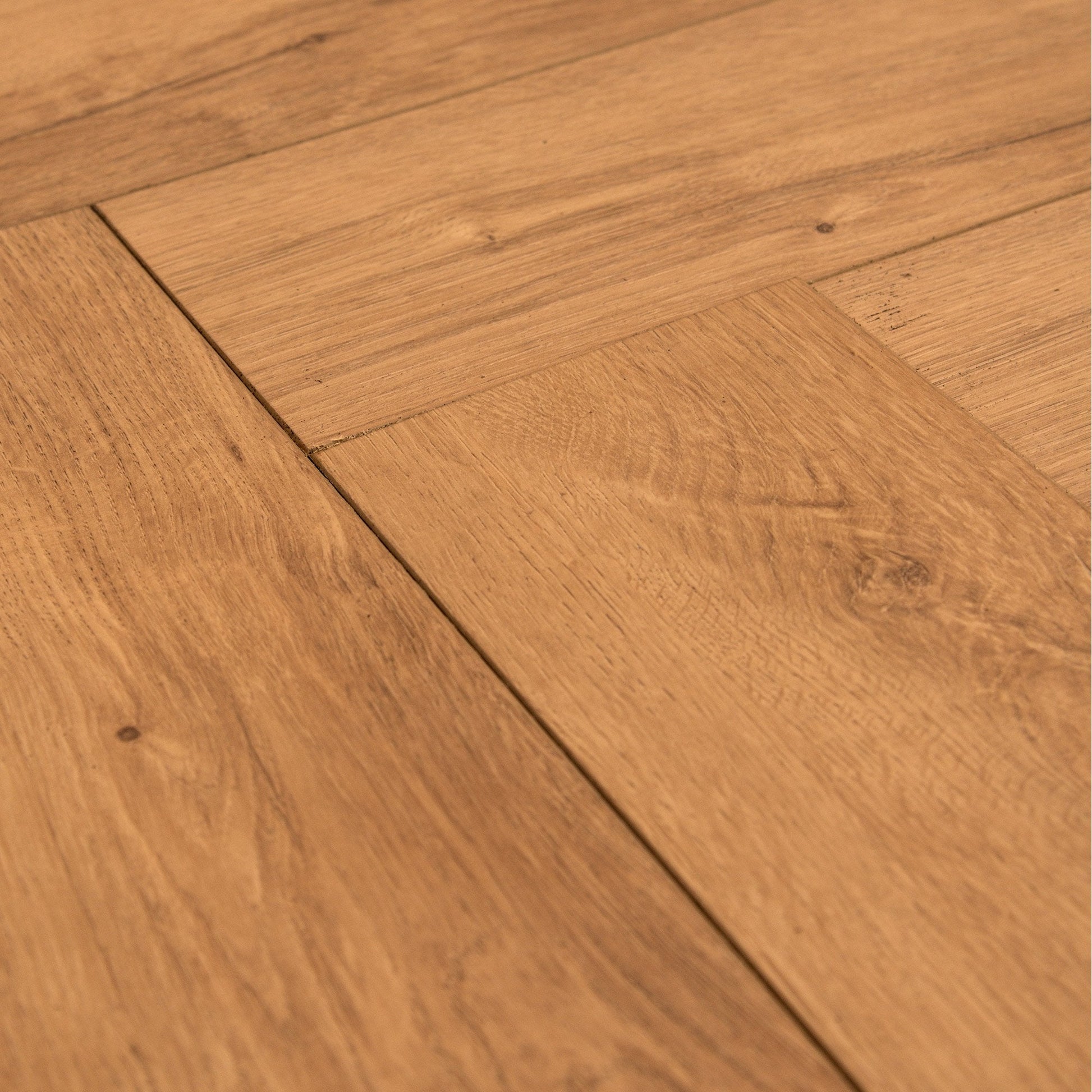 Warm Harvest Oak - Comfort Luxe 12mm Laminate Herringbone Flooring (122147)
