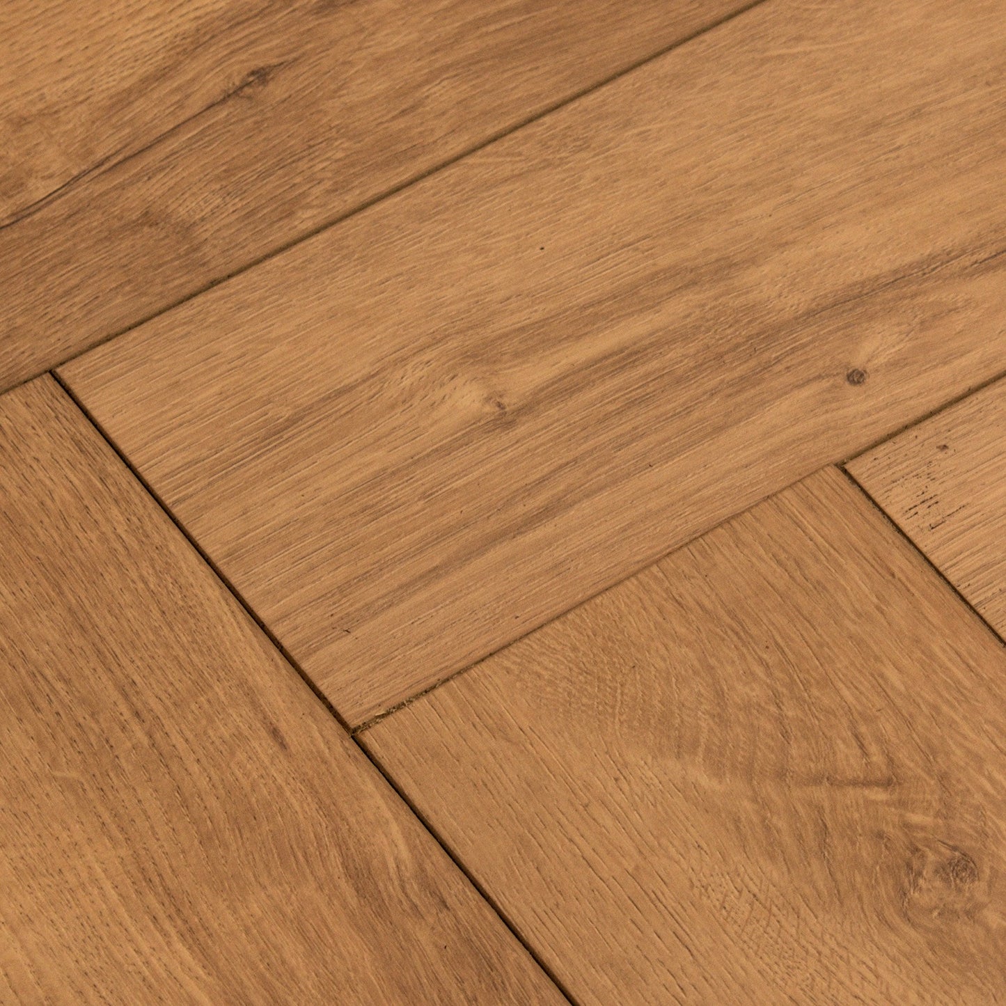 Warm Harvest Oak - Comfort Luxe 12mm Laminate Herringbone Flooring (122147)