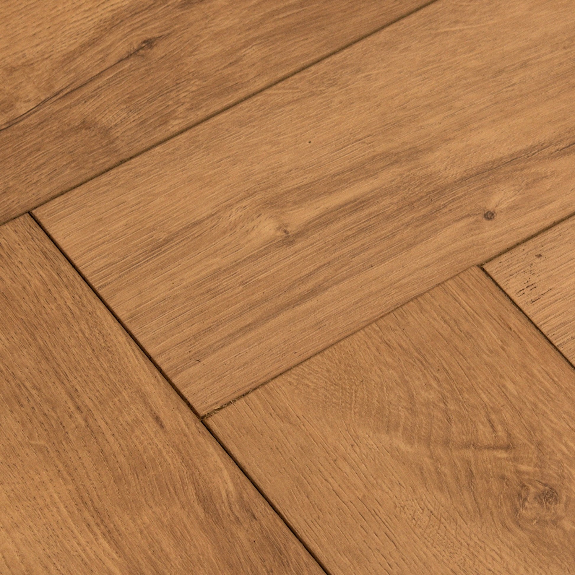 Warm Harvest Oak - Comfort Luxe 12mm Laminate Herringbone Flooring (122147)
