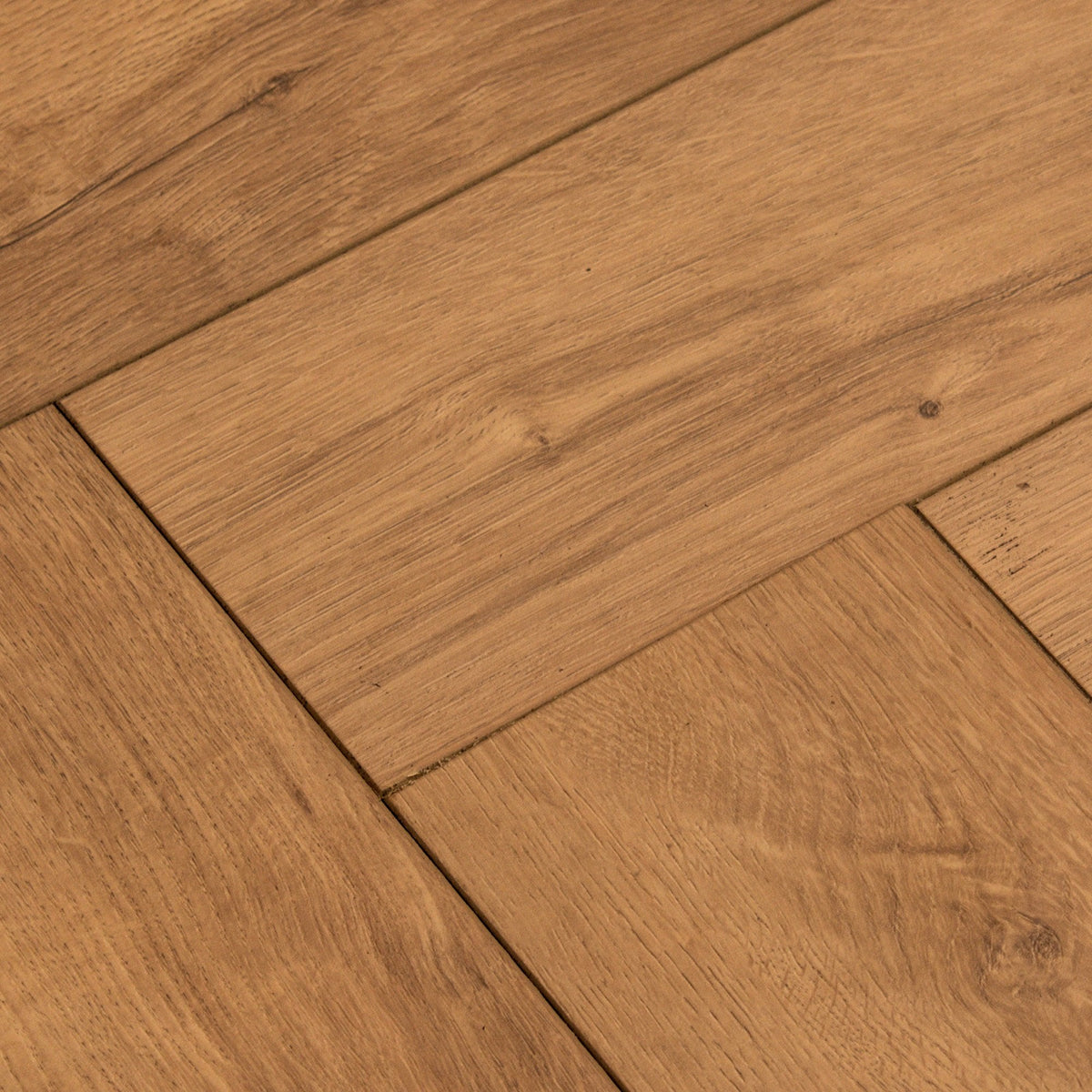 Warm Harvest Oak - Comfort Luxe 12mm Laminate Herringbone Flooring (122147)
