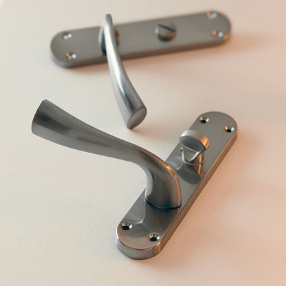 Scimitar Lever on Backplate Bathroom Door Handle Set - Satin Chrome