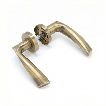 Superior Vega Lever on Round Rose Handle Set - Antique Brass